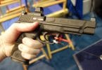 Pistol reflex sights on display