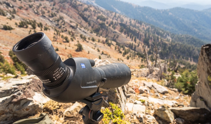 Spotting scope on mountain top