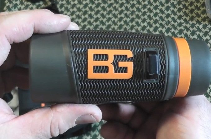 Bear grylls logo on binoculars