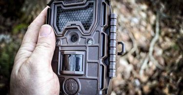 Holding a trail camera
