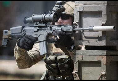 Soldier using thermal scoped gun