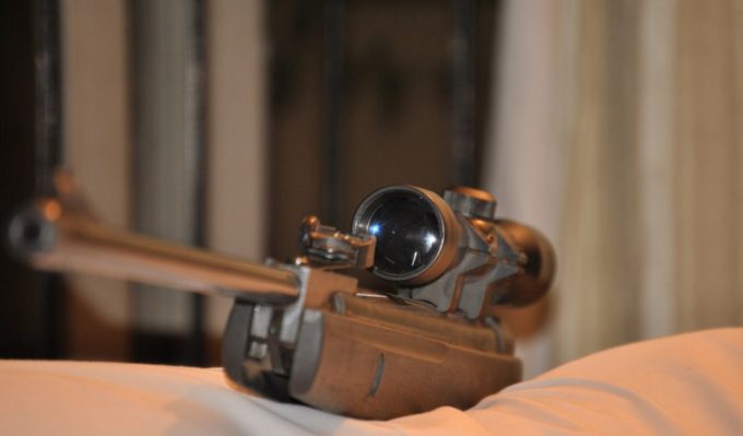 pellet gun scope in room