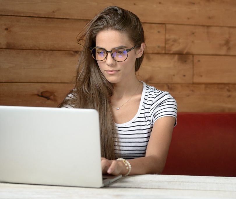 Woman is Working on a Computer