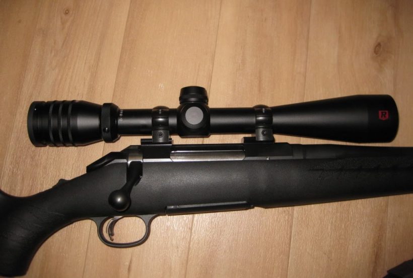 Gun with Redfield Scope